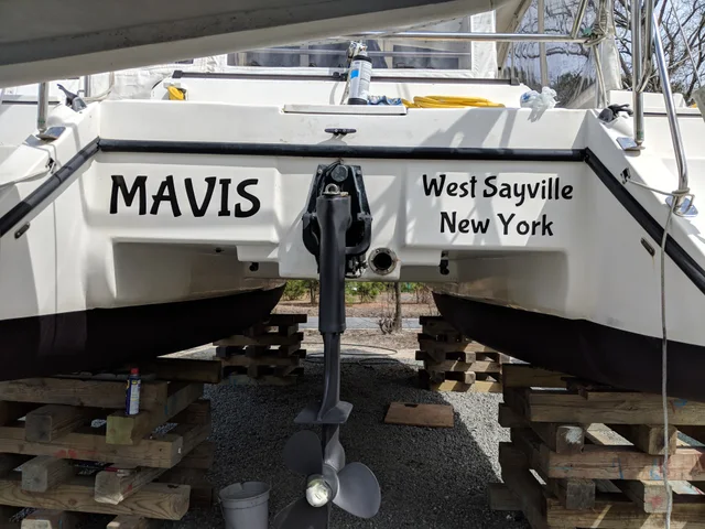 The stern and raised drive leg ashore
